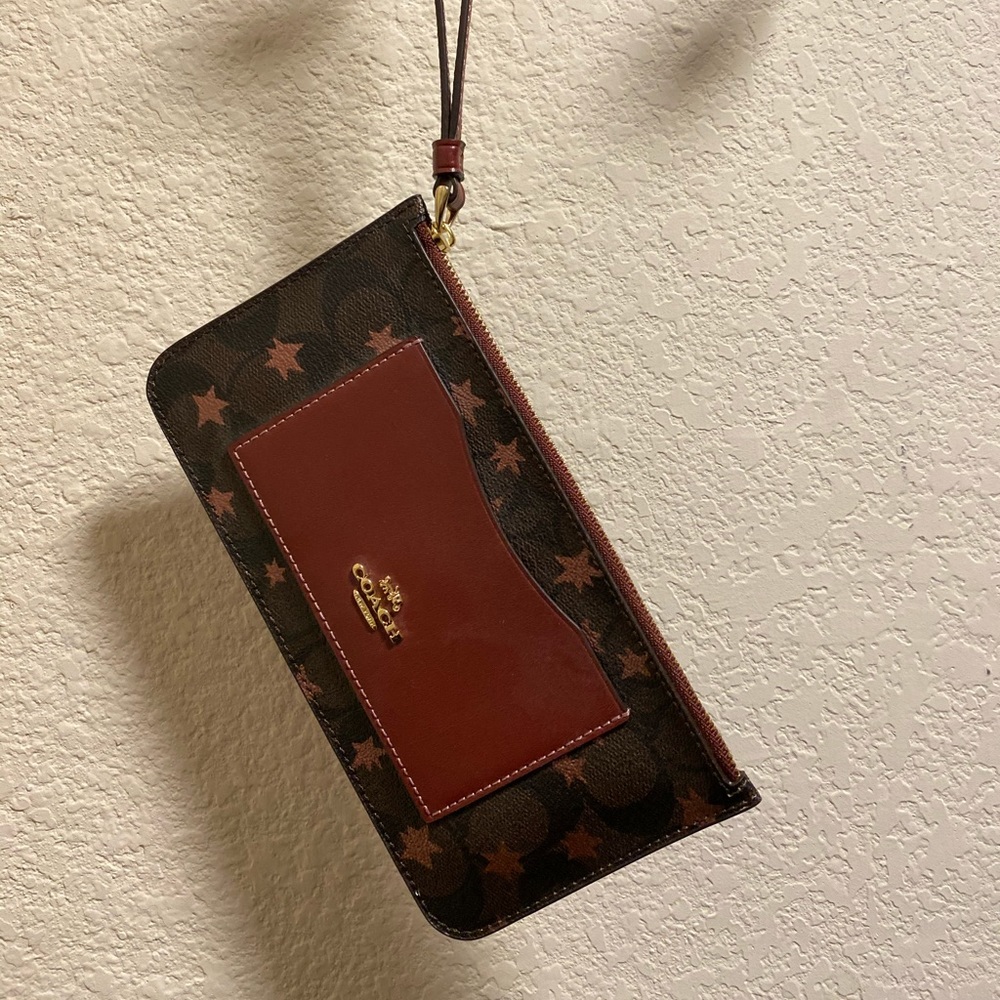 Coach wristlet -brown